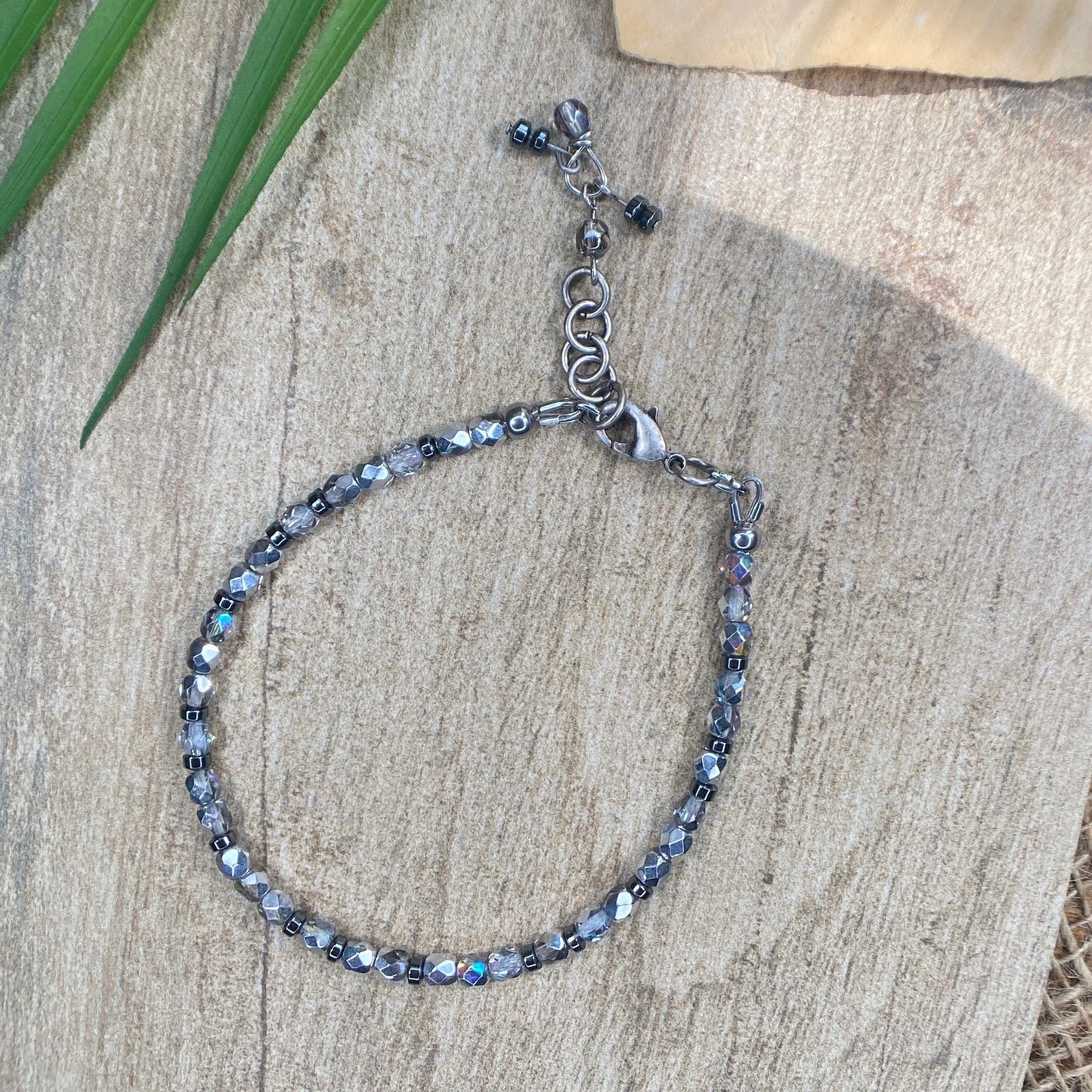 bracelet or anklet with silver rainbow crystals and hematite beads in 4mm